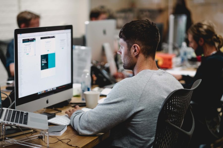 man focused on finishing his work